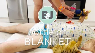 Bottle on blanket