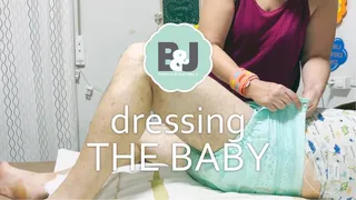 Dressing the baby