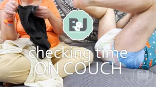 Checking time on couch