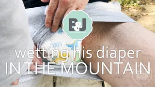 Wetting his diaper in the mountain