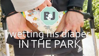 Wetting his diaper in the park