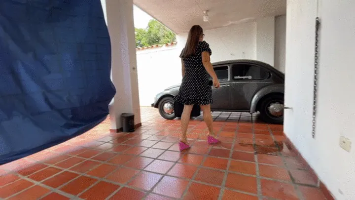 Teacher Barbara warms up and drives the old beetle to go to her class