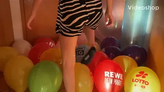 balloon mass pop with 2 girls