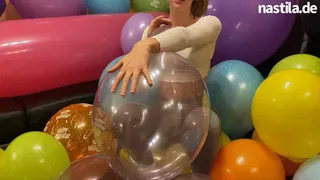 crushing balloons with a giant ball