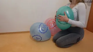 sit popping balloons to the limit