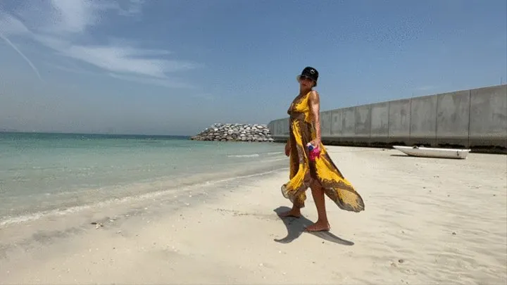 Vika in Dubai on the beach in a transparent bodysuit