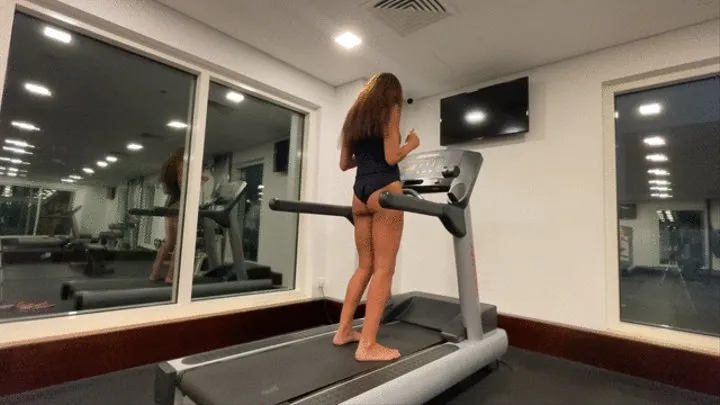 Vika in the gym in a treadmill bodysuit