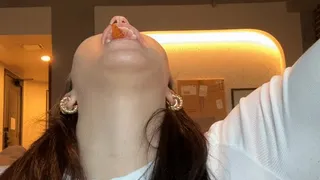 Sammie gags and swallows a gummy on a string