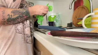 Dishwashing In Green Latex Gloves