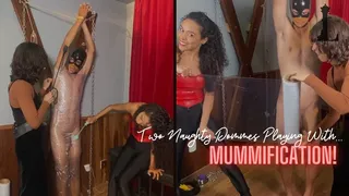 Duda Leal and Olli play at mummifying and scaring a slave