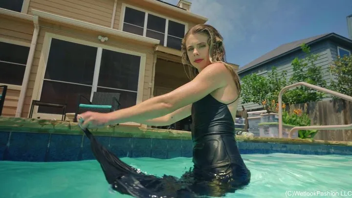 Joy in the Pool Wearing a Sexy Black Satin Dress