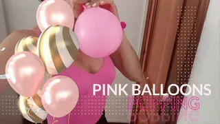 The pink balloons popping by zumbiballons