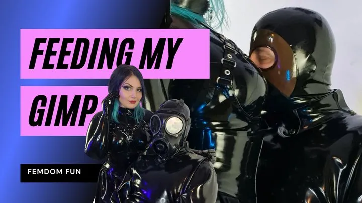 Femdom Rubber Goddess feeds her Gimp