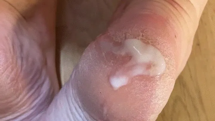 Cum on dry cracked feet in pink slippers after kitchen work