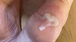 Cum on dry cracked feet in pink slippers after kitchen work