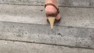 Nylons and heels walking up the stairs