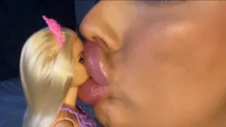 Giantess smooches tiny barbie!