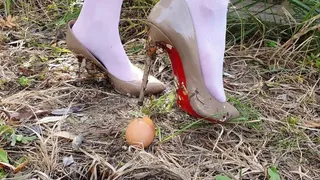 Sexy girl Nina crushing 40 eggs with a rodent glue on top of it, by her high heels