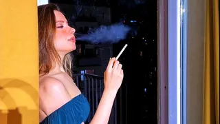 Enjoying my midnight Marlboro Red cigarettes after a party, wearing my new sexy short emerald dress