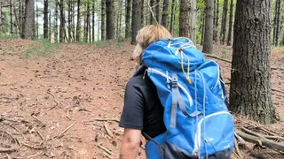 sweaty peeing in the woods with huge backpack