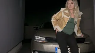 latina girl farting on car outside'