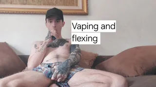 Skinny guy flexing and vaping