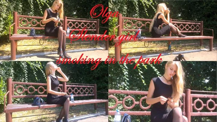 Slender girl Olga smokes in the park