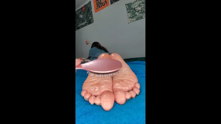 Ankles tied and my oily soles being tickled with a brush