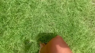 SFW Pulling weeds with feet in neglected yard