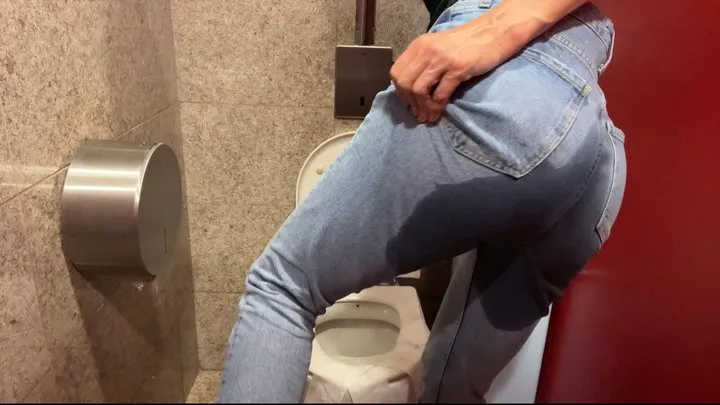 Piss in jeans in public toilet