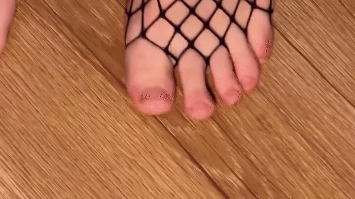 Feet in fishnets