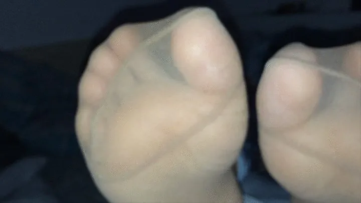 Nylon feet in bed