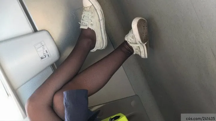 Beauty female crossed legs in nylon with ruined sneakers fetish, dirty shoe and sole details