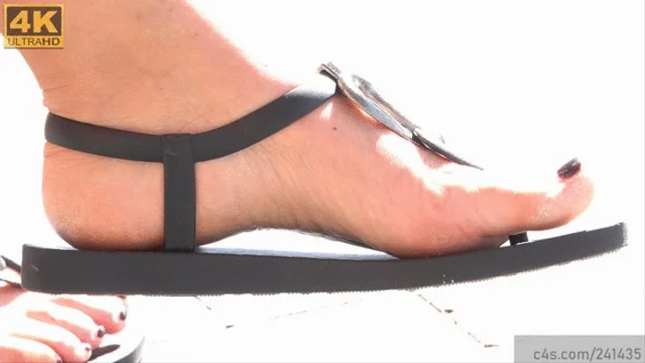 Candid nice arched feet in sandals, foot fetish close-up