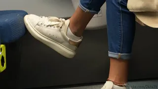 Brat girl puts her sneakers soles on train seat, candid shoe fetish