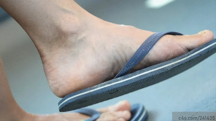 Candid foot fetish, flip flops dangling and feet close-up