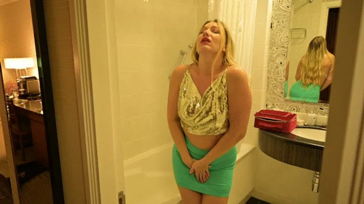 Girl pee in green miniskirt