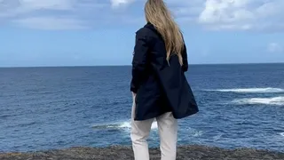 Girl pee outdoor on cliffs