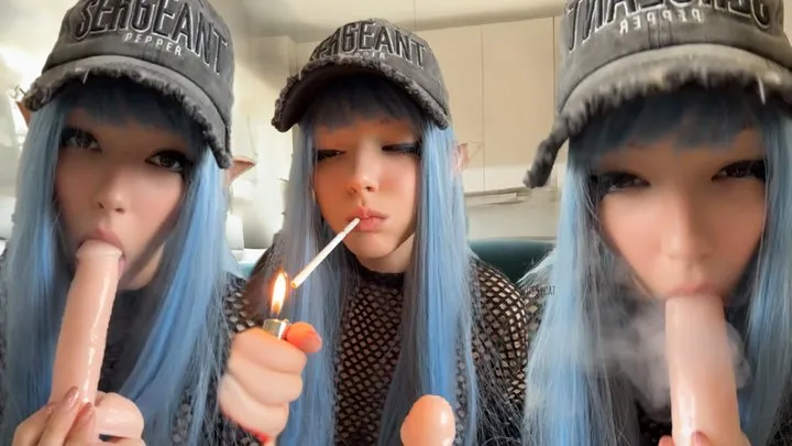 Emo Elf smoking and sucking her favourite dildo