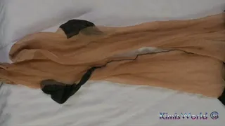 Showing feet in tan stockings