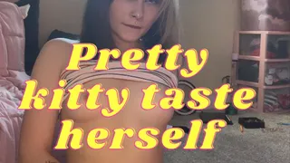 Pretty Kitty Cat Tastes Herself