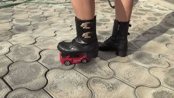 Crushed a toy car with black boots TC