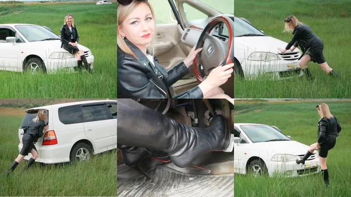 Russian long-legged beauty stuck on the car - pedal pumping
