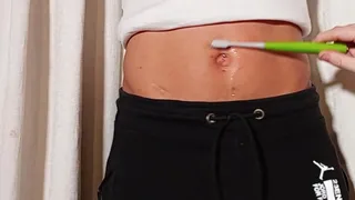 Playying with belly button