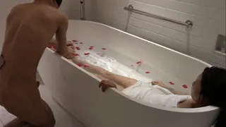 Slaves serve the queen in bathing