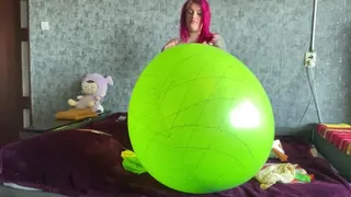 Girl blowing 36inch balloons with pump