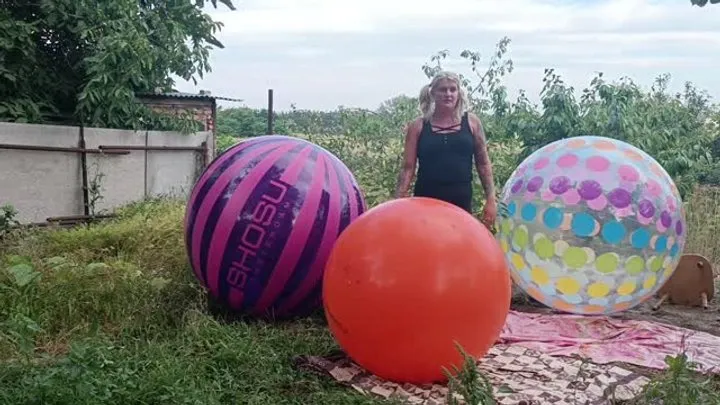 Jumping on big yoga ball outside