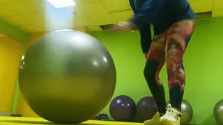 jumping on gymnastick balls in gym