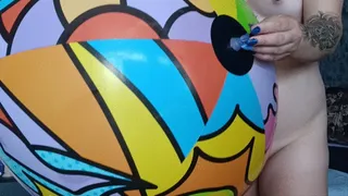 girl sittopop on bestway beachball