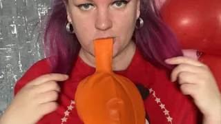 Girl blow orange balloon